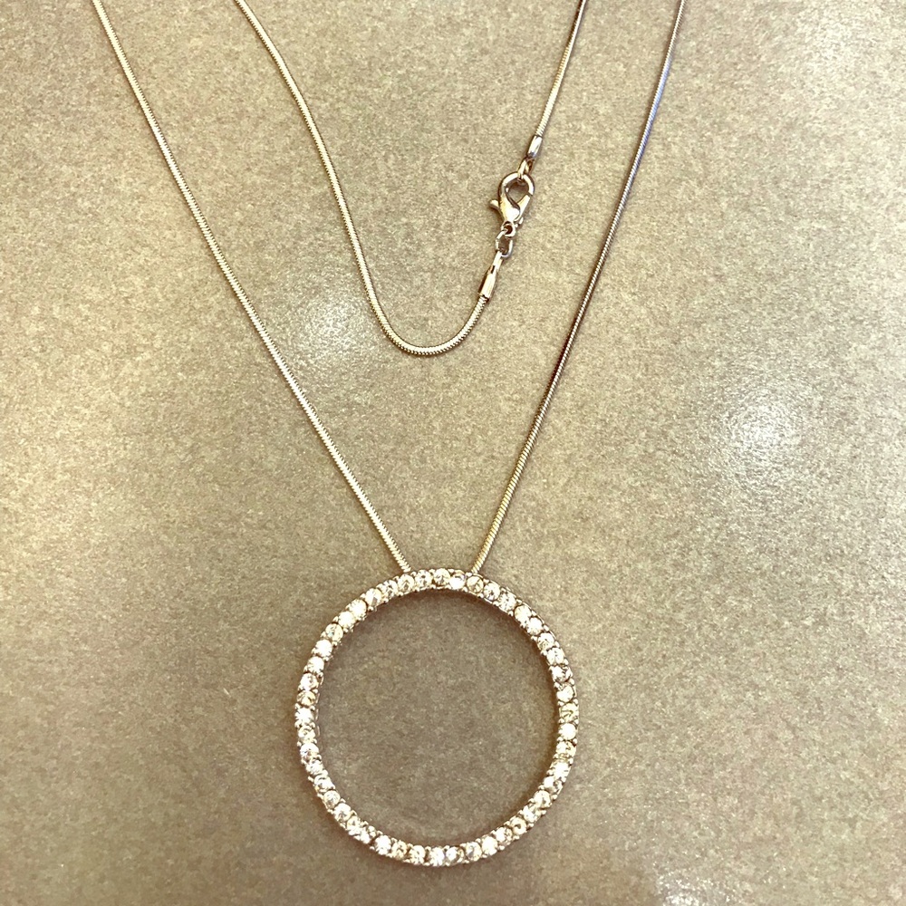 Silver tone crystal circle necklace